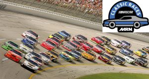 TALLADEGA, AL - OCTOBER 2:  Tony Stewart, driver of the #20 Home Depot Chevrolet, and Dale Jarrett, driver of the #88 UPS Ford, lead the pack during the NASCAR Nextel Cup Series UAW Ford 500 on October 2, 2005 at Talladega Superspeedway in Talladega, Alabama.  (Photo by Matthew Stockman/Getty Images) | Getty Images