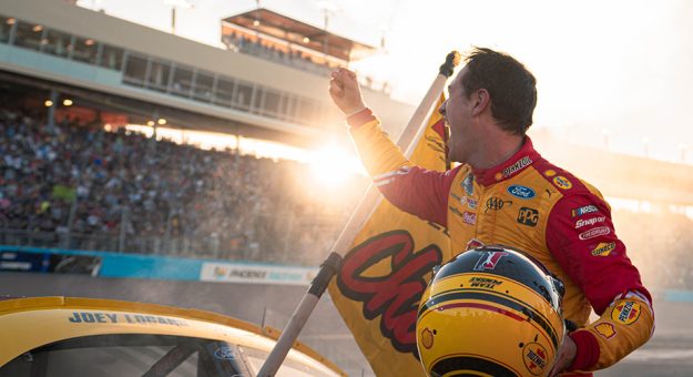 Visit Logano joins elite group with second title page