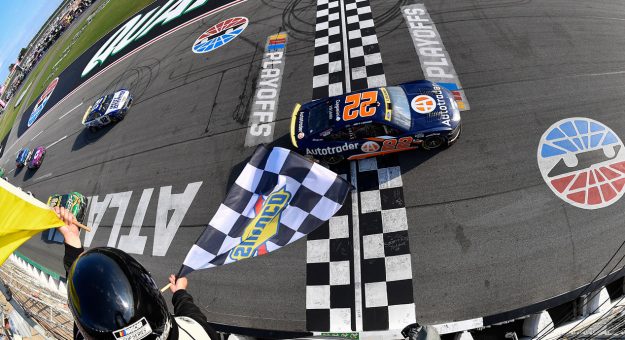 Visit Joey Logano wins playoff opener at Atlanta page