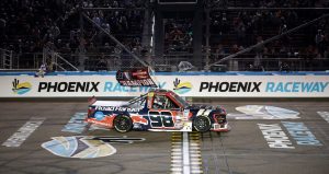 majeski with the championship flag