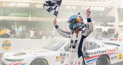 Connor Zilisch celebrates on the frontstretch at Indianapolis Motor Speedway