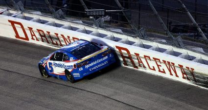 Kyle Larson drives his No. 5 Hendrick Motor Sports Chevrolet against the wall at Darlington Raceway during the Southern 500 on Aug. 31, 2025.
