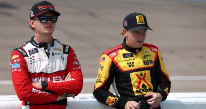 Connor Zilisch (L) and Jesse Love (R) pose for a photo in Victory Lane at Pocono Raceway.
