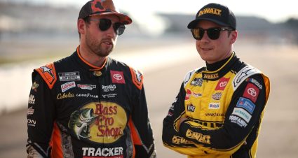 Chase Briscoe and Christopher Bell talk on the grid during practice on Aug. 15, 2025 at Richmond Raceway.
