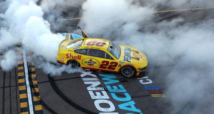 Joey Logano does a burnout in the No. 22 Ford after winning the championship in 2024 at Phoenix Raceway.