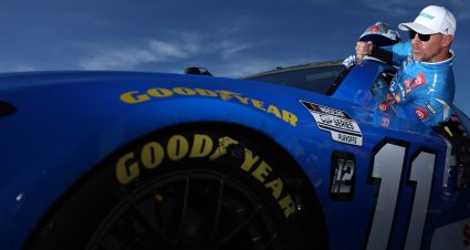 Denny Hamlin climbs into his Joe Gibbs Racing Toyota at New Hampshire.