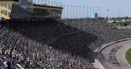 Kyle Larson loads into the No. 5 Chevrolet for Cup Series qualifying at Kansas Speedway