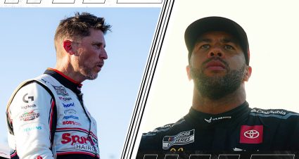 Chase Elliott and Denny Hamlin race to the finish at Kansas.
