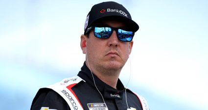 Kyle Busch looks on.