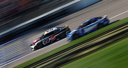 Christopher Bell and Kyle Larson race at Kansas.