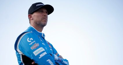 Kyle Larson, Martin Truex Jr. and Denny Hamlin race during the NASCAR Cup Series Championship at Phoenix Raceway on Nov. 7, 2021 in Avondale, Arizona.