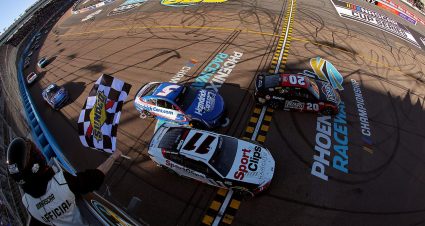 bell hamlin and larson cross checkered flag at phoenix