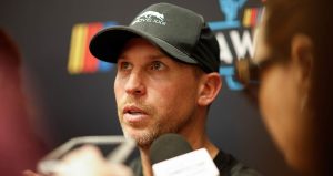 Denny Hamlin, driver of the #11 Progressive Toyota, looks on during qualifying for the NASCAR Cup Series Championship at Phoenix Raceway on November 01, 2025 in Avondale, Arizona.