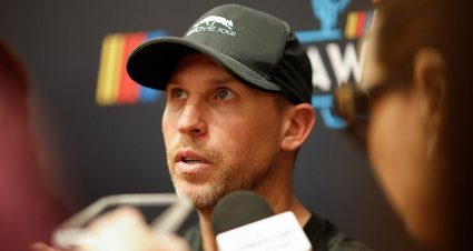 Denny Hamlin, driver of the #11 Progressive Toyota, looks on during qualifying for the NASCAR Cup Series Championship at Phoenix Raceway on November 01, 2025 in Avondale, Arizona.
