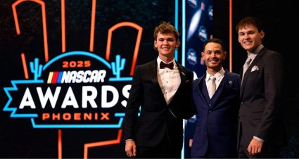Jesse Love, Kyle Larson and Corey Heim look on.