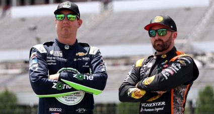 Kyle Busch and Austin Dillon look on before a NASCAR Cup Series race.