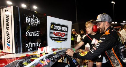 Austin Dillon looks on.