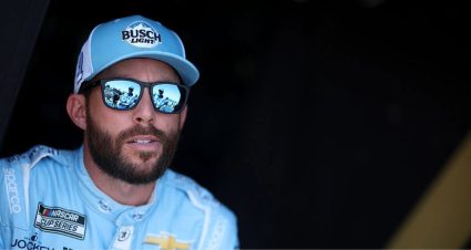 Ross Chastain looks on.