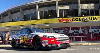 Well-wishers view racing vehicles from Greg Biffle's career on display outside of Bojangles' Coliseum in Charlotte
