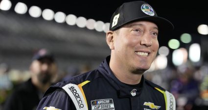 kyle busch smiles on pit road after winning daytona 500 pole