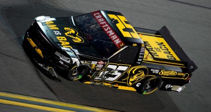Tony Stewart drives the No. 25 Kaulig Ram with damage in the Truck race at Daytona.