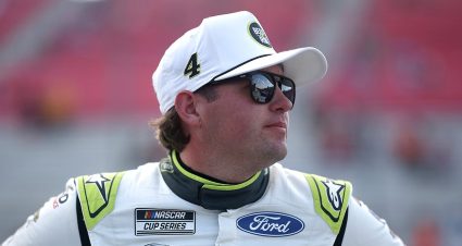 Noah Gragson, driver of the #4 Beef A Roo Ford, looks on during qualifying for the NASCAR Cup Series Enjoy Illinois 300 at WWT Raceway on September 06, 2025 in Madison, Illinois.