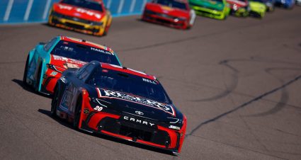 Christopher Bell leads Denny Hamlin around the track on March 8, 2026 at Phoenix Raceway.