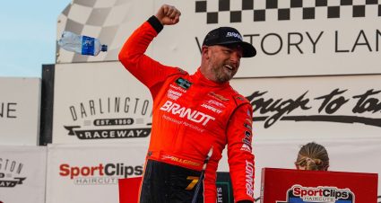 Justin Allgaier celebrates an O'Reilly Auto Parts Series win at Darlington.