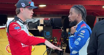 Jesse Love and Rajah Caruth speak after a NASCAR race at Martinsville.