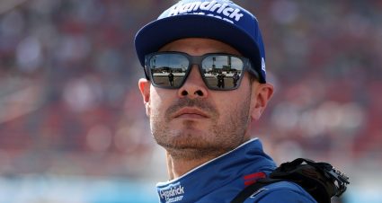 Kyle Larson looks on at a NASCAR Cup Series race.