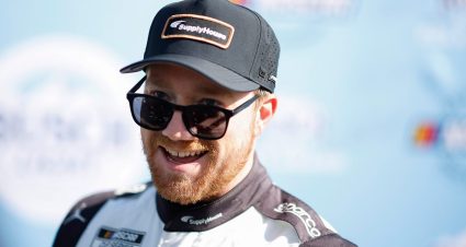 Tyler Reddick, driver of the No. 45 Supply House Toyota, reacts after winning the Busch Light Pole Award during qualifying for the NASCAR Cup Series AdventHealth 400 at Kansas Speedway on April 18, 2026 in Kansas City, Kansas.