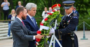 Ross Chastain and Charlotte Motor Speedway's Greg Walter lay a wreath at the Tomb of the Unknown Soldier at Arlington National Cemetery.