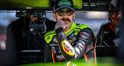 Ryan Blaney, driver of the No. 12 Menards Scotts Ford looks on during practice ahead of the NASCAR Cup Series AdventHealth 400 at Kansas Speedway on April 18, 2026 in Kansas City, Kansas.