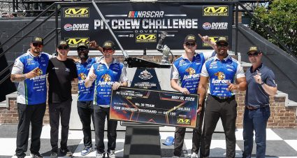 The No. 38 Front Row Motorsports pit crew tends to the machine driven by Zane Smith during the 2026 Mechanix Wear Pit Crew Challenge at Dover Motor Speedway.