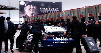 The No. 33 car gets pushed as a Kyle Busch remembrance is shown on the video board at Charlotte Motor Speedway.