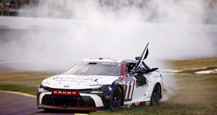Denny Hamlin celebrates at Michigan.