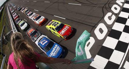 NASCAR O'Reilly Auto Parts Series cars race at Pocono Raceway.