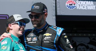 Connor Zilisch, driver of the #88 Roto-Rooter Chevrolet, (L) is congratulated by Shane Van Gisbergen, driver of the #9 Quad Lock Chevrolet, in victory lane after winning the NASCAR Xfinity Series Pit Boss/FoodMaxx 250 at Sonoma Raceway on July 12, 2025 in Sonoma, California.