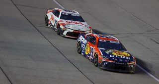 Christopher Bell and Chase Briscoe in a NASCAR Cup Series race at Chicagoland.