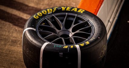 Goodyear tire sits on the wall of a NASCAR race.