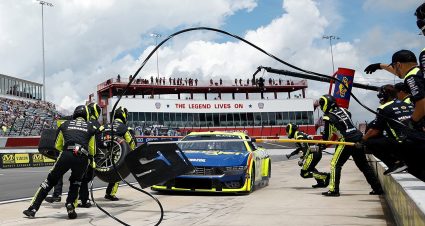 : Ryan Blaney, driver of the #12 Menards/Wrangler Ford, pits during qualifying and pit crew challenge for the NASCAR Cup Series All-Star Race
