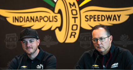 Alex Bowman, left, and Hendrick Motorsports president Jeff Andrews speak at Indianapolis Motor Speedway.