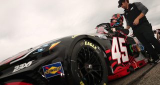 tyler reddick climbs into his no. 45 toyota