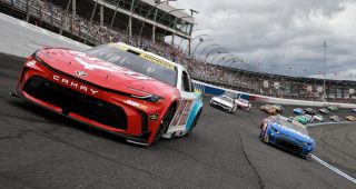Chase Briscoe and Kyle Larson at Charlotte Motor Speedway.